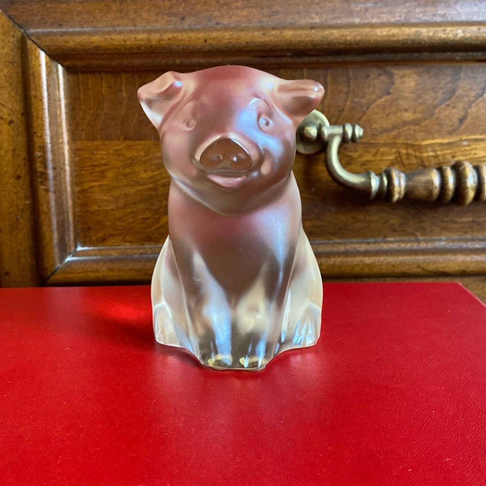 Lalique pig figures.